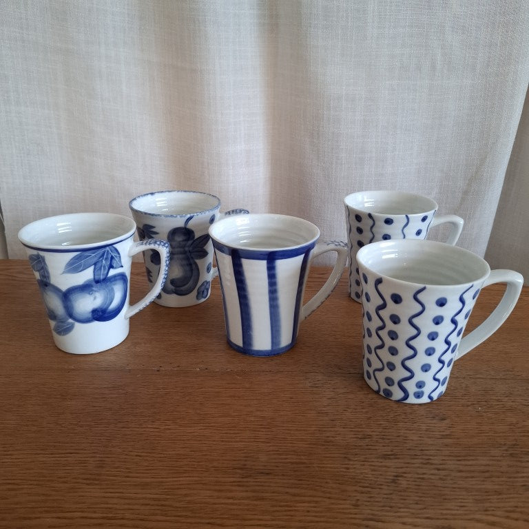 Pair of 1990's Croix De Sud Handpainted Stripes & Spots Mugs